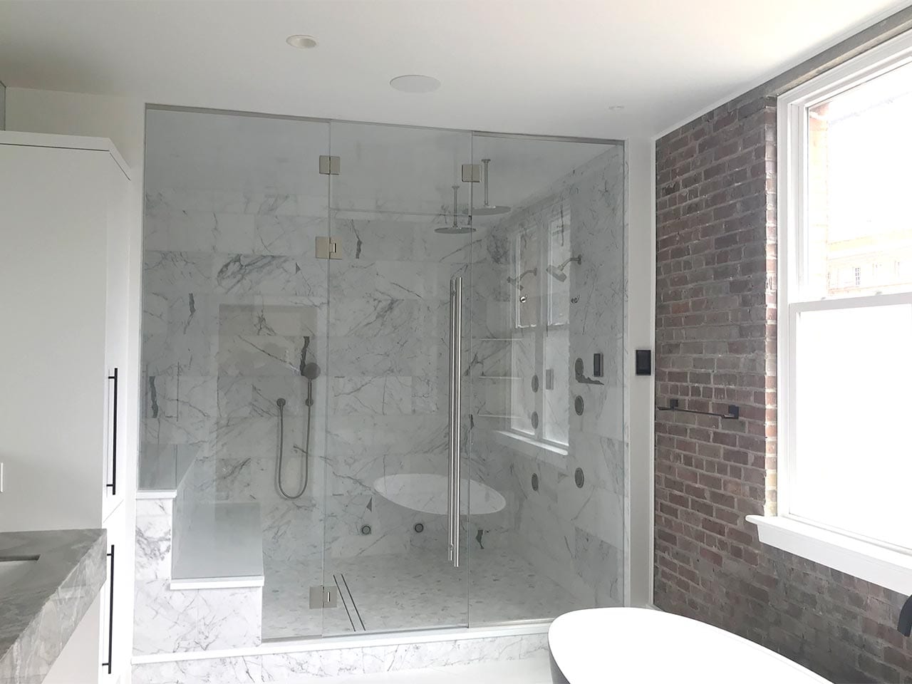 Frameless Shower Door Installation by Reliable Glass & Mirror