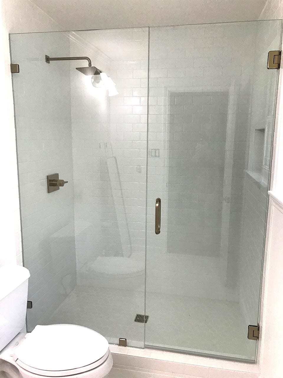 Glass Shower Enclosure Installation by Reliable Glass & Mirror